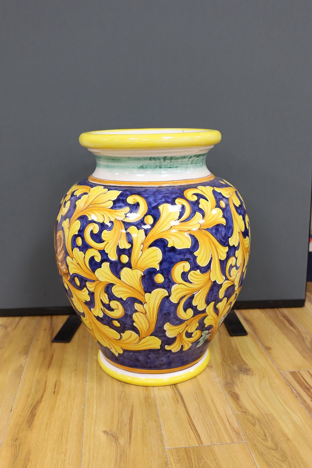 A large blue and yellow Italian Majolica style vase, marked to base - 59cm high